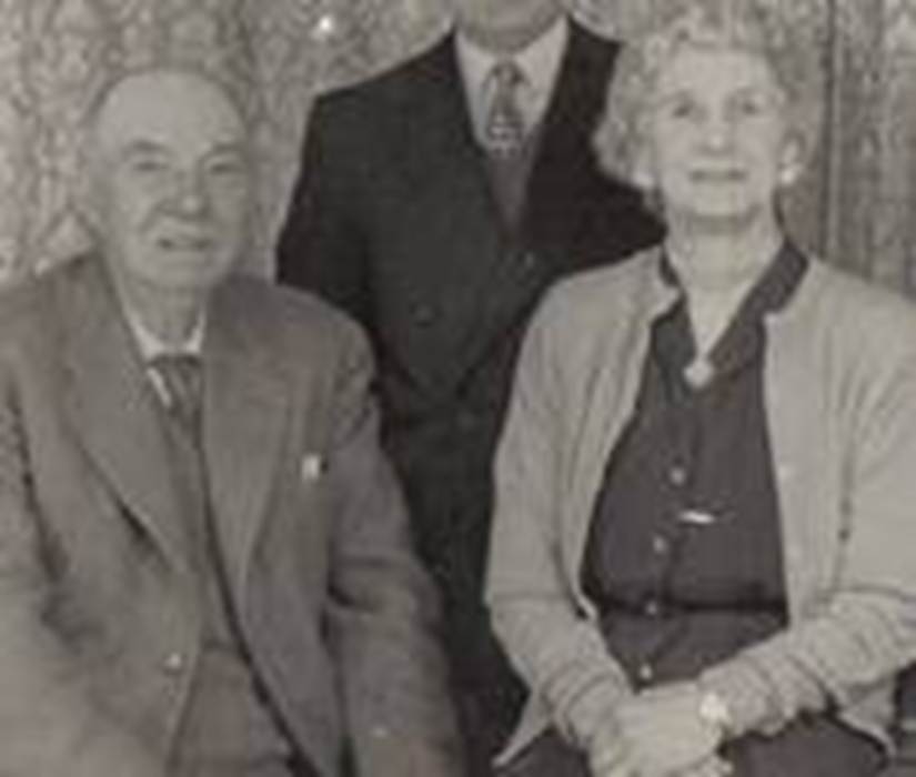 A group of people posing for a photo
Description automatically generated